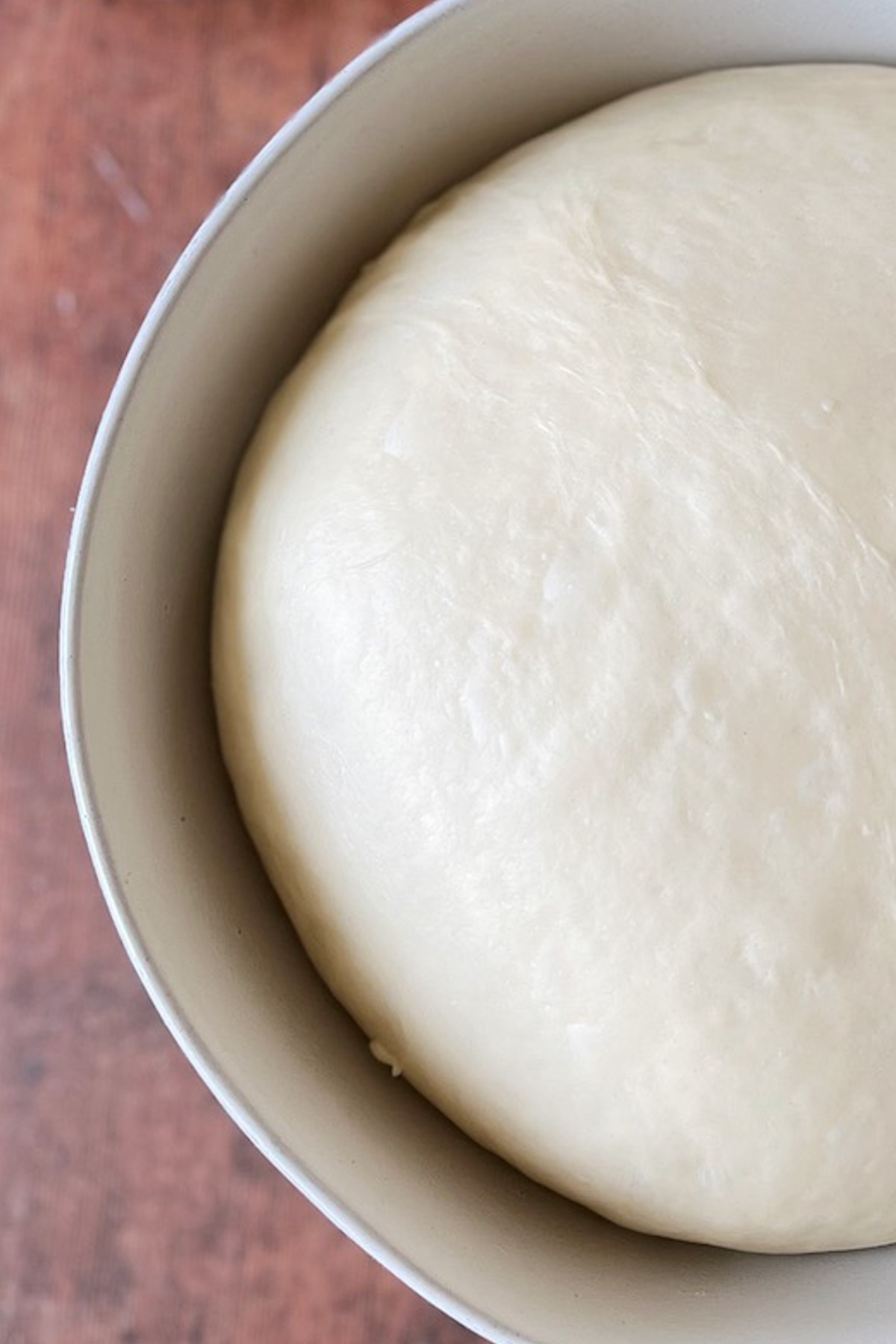 A bowl of dough rising.