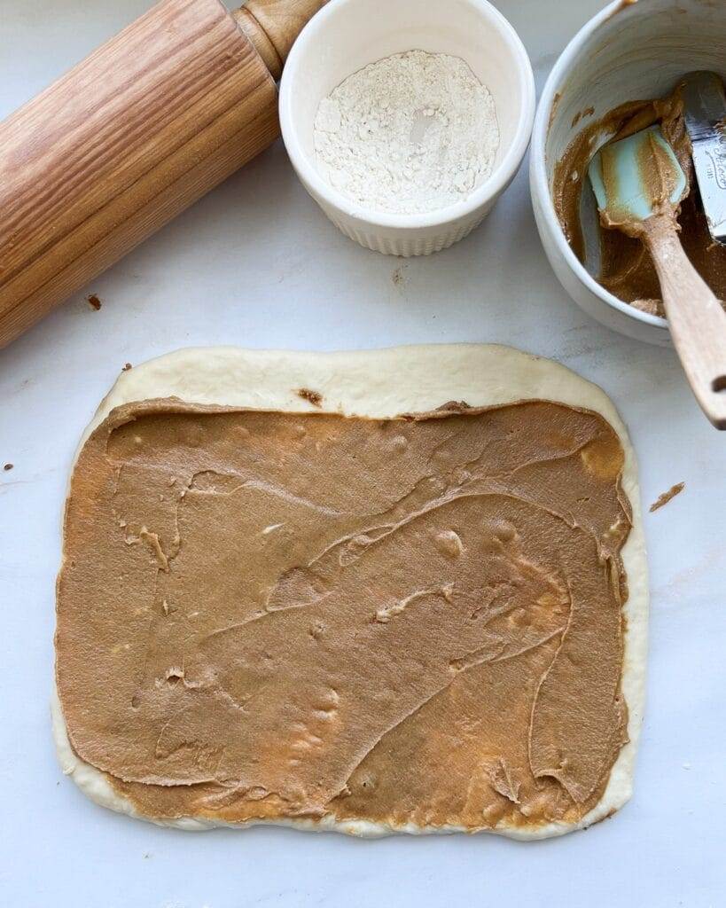 Biscoff Cinnamon Roll dough with filling.