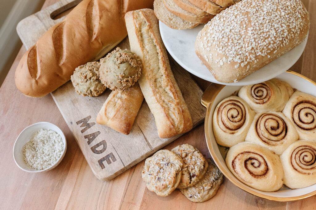 A table full of breads made with instant yeast and active dry yeast.