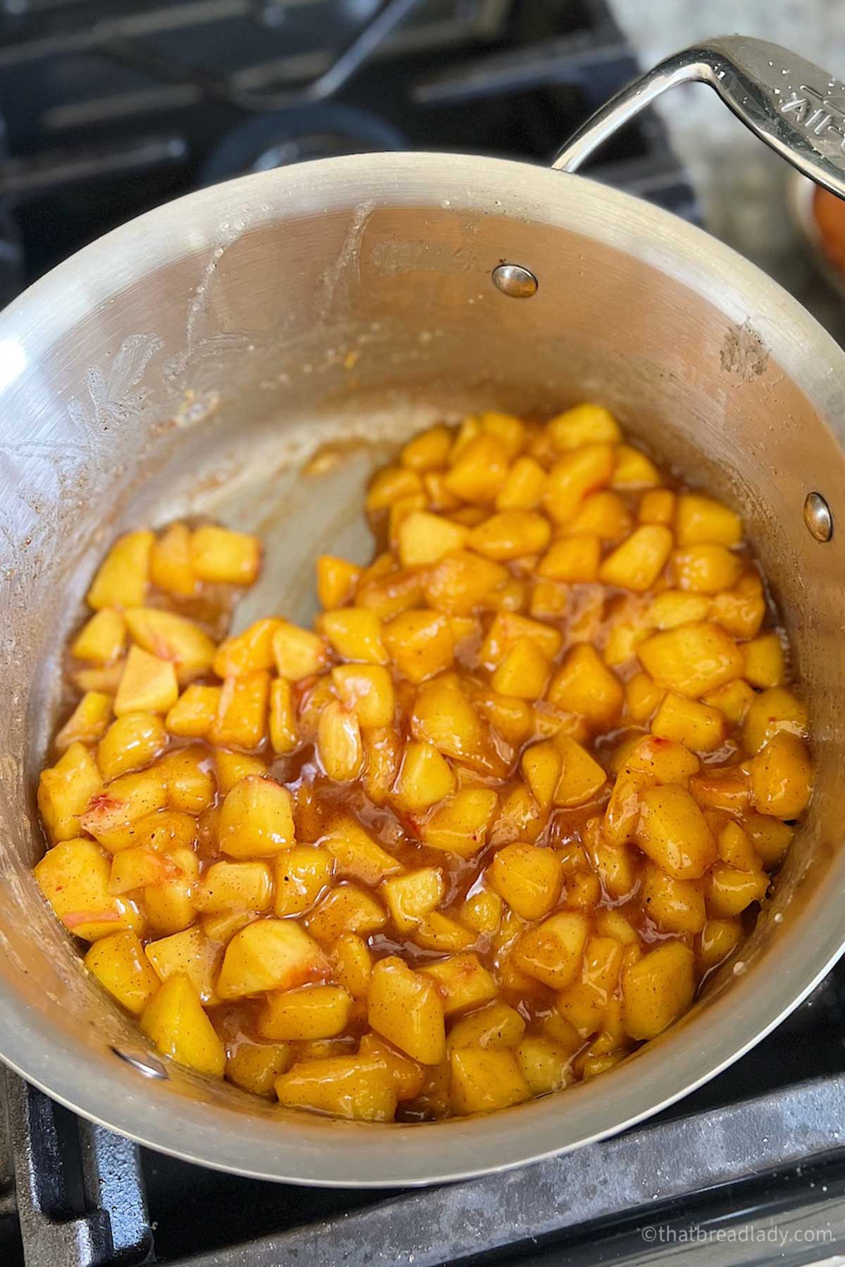 Peaches in a saucepan.