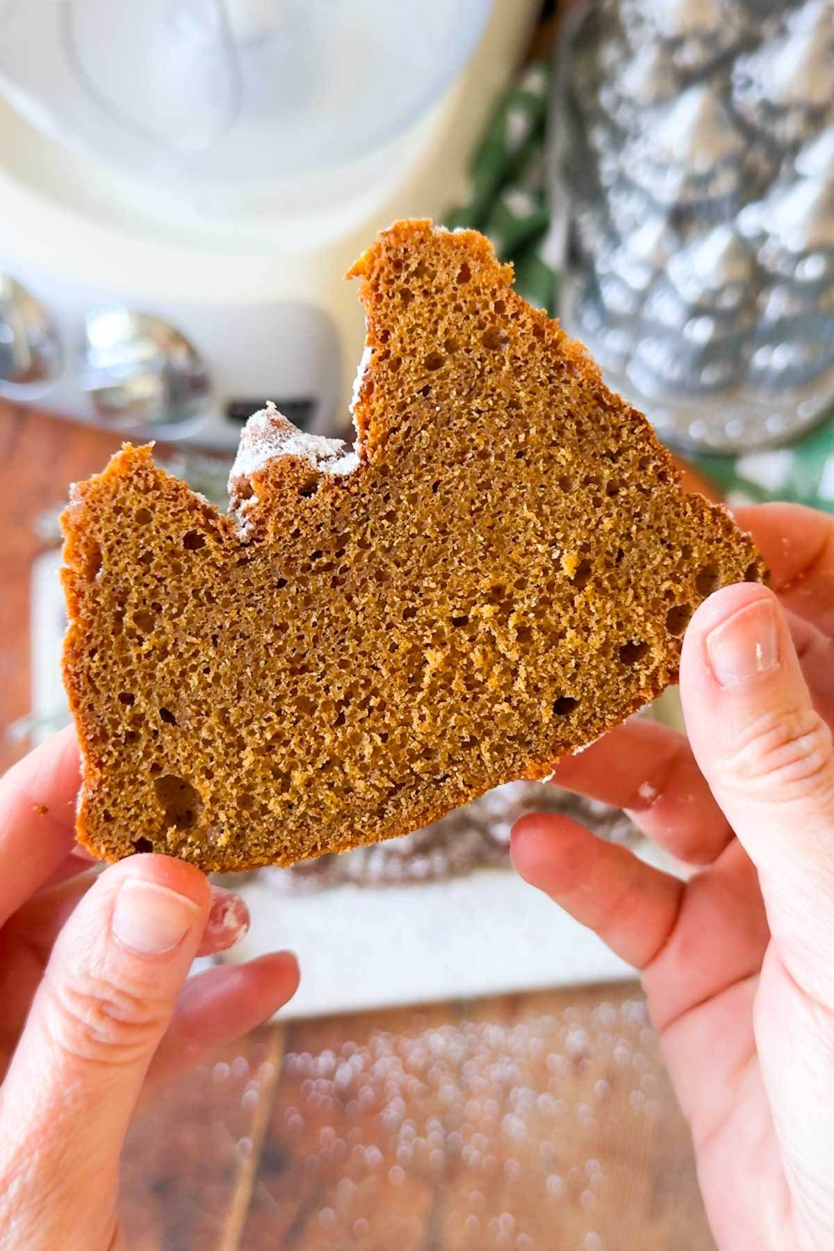 A slice of spiced gingerbread cake loaf.