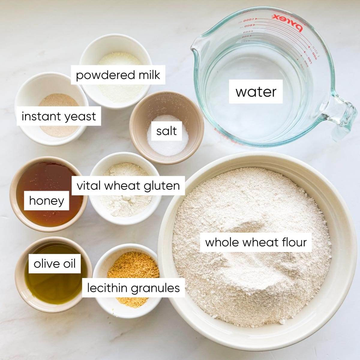 All the ingredients for honey whole wheat sandwich bread.